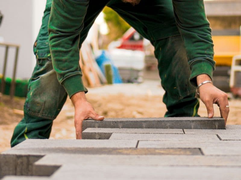 Backyard transformation with new lawn and retaining wall